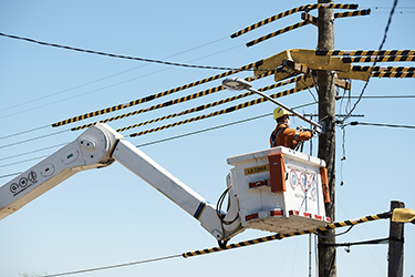 Ausgrid line worker repairing a streetlight