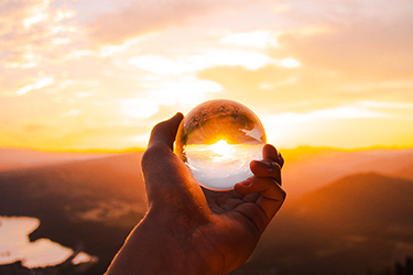 Future of the grid - Crystal ball held up to the sun