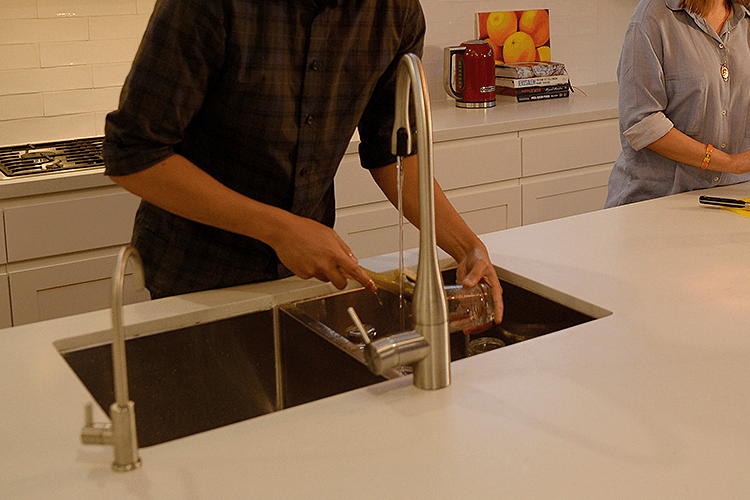 Hot water flowing from tap